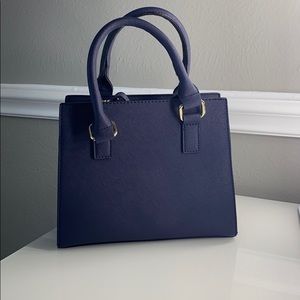 A navy/blue purse